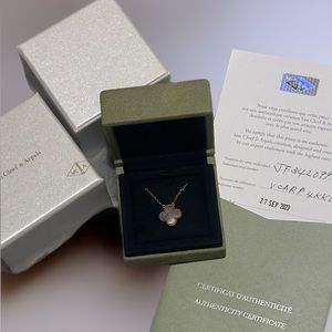 Authentic VCA rose gold, mother pearl necklace.